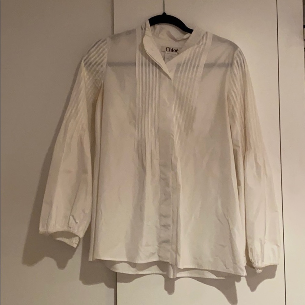 All white long sleeve button down made by Chloé